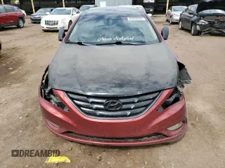 2012 Hyundai Sonata Limited z VIN 5NPEC4AC9CH401499, wystawiony jako Copart lot #63956203 z przebiegiem 198 273 mil mil oraz Szkoda całkowita • Salvage title. Historia ofert i sprzedaży dostępna na DreamBid. Obrazek 5.