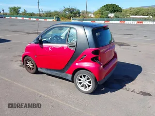 2009 Smart fortwo Pure z VIN WMEEJ31XX9K219695, wystawiony jako IAAI lot #41280141 z przebiegiem 93 896 mil mil oraz . Historia ofert i sprzedaży dostępna na DreamBid. Obrazek 3.