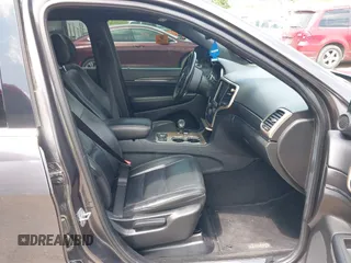 2014 Jeep Grand Cherokee Limited z VIN 1C4RJFBG5EC431229, wystawiony jako IAAI lot #42436481 z przebiegiem 102 442 mil mil oraz . Historia ofert i sprzedaży dostępna na DreamBid. Obrazek 5.
