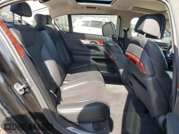 2019 BMW 7 Series with VIN WBA7F2C13KB242430, listed as a Copart auction lot 55525835 with 58,559 mi miles and Salvage title. Bid and sale history available at DreamBid. Image 10.