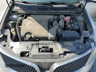 2013 Lincoln MKS with VIN 1LNHL9EK0DG612314, listed as a Copart auction lot 52901685 with 124,828 mi miles and Salvage title. Bid and sale history available at DreamBid. Image 11.