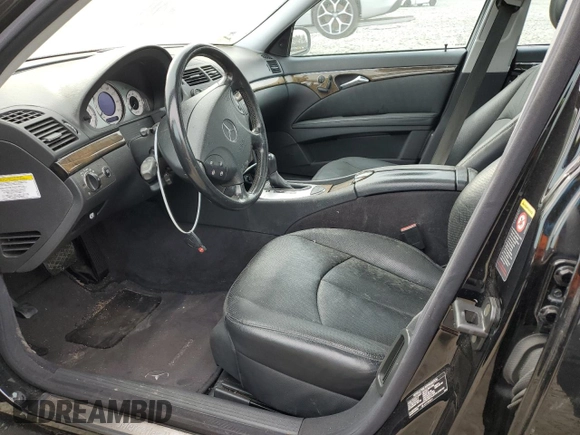 2005 Mercedes-Benz E 5.0L with VIN WDBUF70J45A645154, listed as a Copart auction lot 82883524 with 134,088 mi miles and Salvage Title. Bid and sale history available at carsss.com. Image 7.