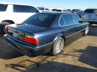 2001 BMW 7 Series 740iL with VIN WBAGH83401DP20636, listed as a IAAI auction lot 41646017 with 60,098 mi miles. Bid and sale history available at carsss.com. Image 4.