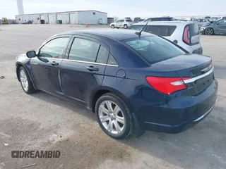 2014 Chrysler 200 Touring with VIN 1C3CCBBB2EN128771, listed as a IAAI auction lot 42148625 with 77,848 mi miles and . Bid and sale history available at DreamBid. Image 3.