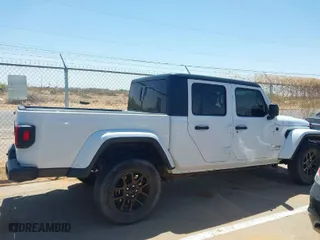 2023 Jeep Gladiator Overland with VIN 1C6HJTFG5PL523116, listed as a IAAI auction lot 42031287 with 1 mi miles. Bid and sale history available at carsss.com. Image 13.