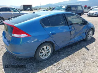 2010 Honda Insight EX with VIN JHMZE2H73AS014811, listed as a IAAI auction lot 42517559 with 173,579 mi miles and . Bid and sale history available at DreamBid. Image 4.