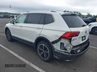 2018 Volkswagen Tiguan SEL with VIN 3VV2B7AX4JM012840, listed as a IAAI auction lot 42263511 with 105,510 mi miles and . Bid and sale history available at DreamBid. Image 3.