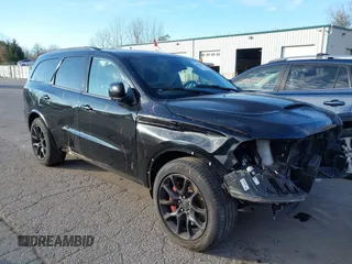 2023 Dodge Durango SRT 392 Premium with VIN 1C4SDJGJ9PC693449, listed as a IAAI auction lot 40796697 with 4,633 mi miles and . Bid and sale history available at carsss.com. Image 1.