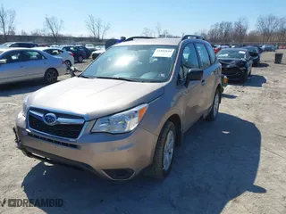 2015 Subaru Forester 2.5i with VIN JF2SJABC1FH577568, listed as a IAAI auction lot 41889849 with 58,479 mi miles. Bid and sale history available at carsss.com. Image 2.