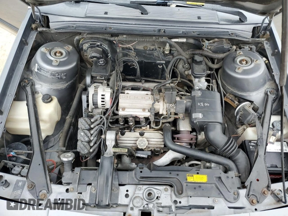 1992 Oldsmobile Cutlass z VIN 1G3AL54N4N6438104, wystawiony jako Copart lot #74415204 z przebiegiem 118 459 mil mil oraz Szkody całkowita. Historia ofert i sprzedaży dostępna na DreamBid. Obrazek 11.