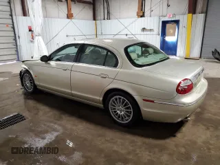 2006 Jaguar S-Type 3 z VIN SAJWA01A96FN53736, wystawiony jako Copart lot #52300005 z przebiegiem 68 472 mil mil oraz Szkody całkowita. Historia ofert i sprzedaży dostępna na DreamBid. Obrazek 2.