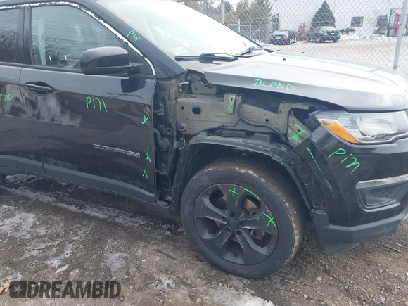 2018 Jeep Compass Altitude with VIN 3C4NJDBB1JT132052, listed as a IAAI auction lot 41622700 with 99,534 mi miles and . Bid and sale history available at carsss.com. Image 6.