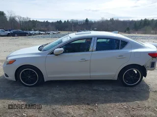 2013 Acura ILX Premium z VIN 19VDE1F53DE017389, wystawiony jako IAAI lot #41897366 z przebiegiem 161 556 mil mil oraz . Historia ofert i sprzedaży dostępna na DreamBid. Obrazek 15.