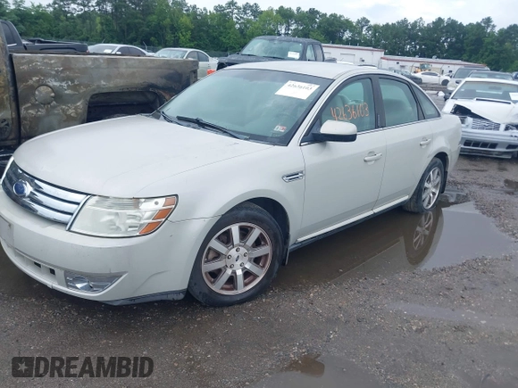 2008 Ford Taurus SEL with VIN 1FAHP24W78G131136, listed as a IAAI auction lot 42636103 with 112,877 mi miles and . Bid and sale history available at DreamBid. Image 2.