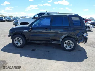 2001 Suzuki Grand Vitara JLX with VIN JS3TD62V414156342, listed as a IAAI auction lot 41762508 with 214,235 mi miles. Bid and sale history available at carsss.com. Image 15.