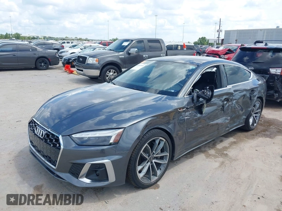 2022 Audi A5 Sportback S line Premium Plus z VIN WAUFACF5XNA009427, wystawiony jako IAAI lot #40203616 z przebiegiem 54 005 mil mil oraz . Historia ofert i sprzedaży dostępna na DreamBid. Obrazek 17.