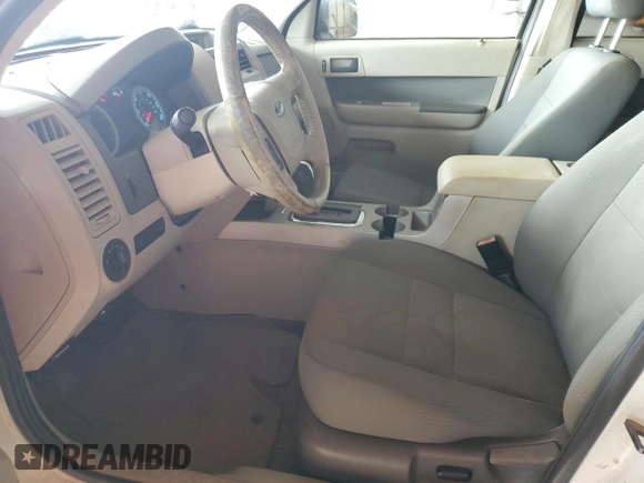 2010 Ford Escape Hybrid z VIN 1FMCU4K32AKA08232, wystawiony jako Copart lot #55356045 z przebiegiem 118 496 mil mil oraz Szkoda całkowita • Salvage title. Historia ofert i sprzedaży dostępna na DreamBid. Obrazek 7.