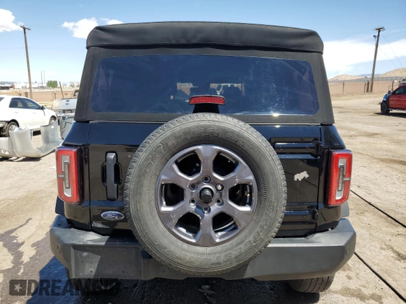 2022 Ford Bronco with VIN 1FMDE5BH7NLB14159, listed as a Copart auction lot 54911305 with 20,539 mi miles and Salvage title. Bid and sale history available at DreamBid. Image 6.
