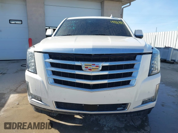 2015 Cadillac Escalade ESV Premium z VIN 1GYS4TKJ9FR700022, wystawiony jako IAAI lot #41748188 z przebiegiem 166 416 mil mil oraz . Historia ofert i sprzedaży dostępna na DreamBid. Obrazek 12.