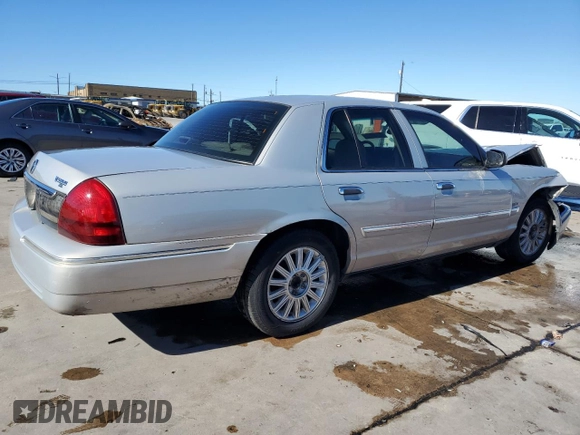 2009 Mercury Grand Marquis LS with VIN 2MEHM75V09X619313, listed as a Copart auction lot 41596455 with 198,017 mi miles and Salvage Title. Bid and sale history available at DreamBid. Image 3.