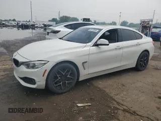 2015 BMW 4 Series 428i xDrive with VIN WBA4C9C53FD331044, listed as a Copart auction lot 60275995 with 159,056 mi miles and Salvage title. Bid and sale history available at DreamBid. Image 1.