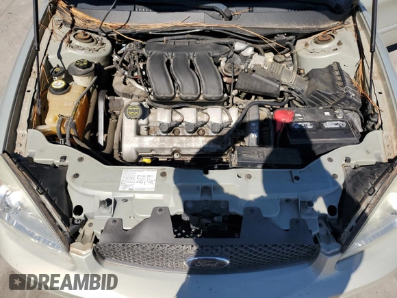 2004 Ford Taurus SEL with VIN 1FAFP56S74G186893, listed as a Copart auction lot 75484514 with 74,229 mi miles and Salvage Title. Bid and sale history available at DreamBid. Image 11.