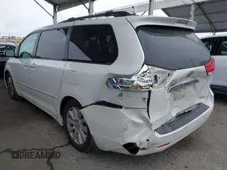 2011 Toyota Sienna XLE AAS with VIN 5TDYK3DC8BS148948, listed as a IAAI auction lot 41806293 with 144,645 mi miles and . Bid and sale history available at DreamBid. Image 3.