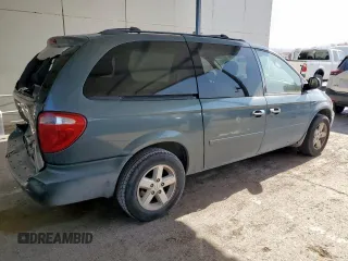 2005 Dodge Caravan SXT with VIN 2D4GP44L75R335536, listed as a Copart auction lot 60933985 with 212,231 mi miles and Salvage title. Bid and sale history available at DreamBid. Image 3.