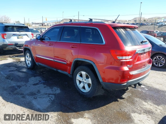 2011 Jeep Grand Cherokee 70th Anniversary with VIN 1J4RR4GT2BC703163, listed as a IAAI auction lot 41763149 with 184,523 mi miles. Bid and sale history available at carsss.com. Image 3.