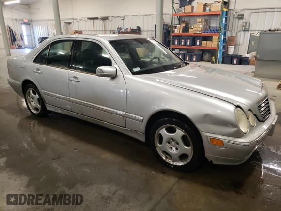 2001 Mercedes-Benz E 320/430 4 Matic with VIN WDBJF83J31X057905, listed as a Copart auction lot 50656425 with 155,217 mi miles and Salvage Title. Bid and sale history available at DreamBid. Image 4.