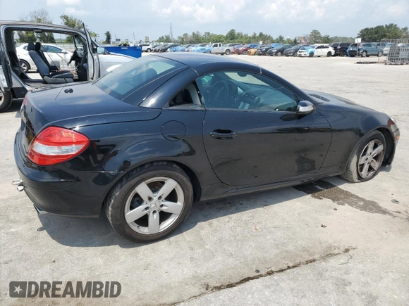 2007 Mercedes-Benz SLK-Class 3.0L with VIN WDBWK54F57F157433, listed as a Copart auction lot 66233794 with 104,198 mi miles and Salvage Title. Bid and sale history available at carsss.com. Image 3.
