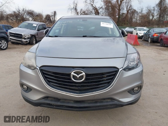 2013 Mazda CX-9 Grand Touring z VIN JM3TB3DV1D0401102, wystawiony jako IAAI lot #41248346 z przebiegiem 122 555 mil mil oraz . Historia ofert i sprzedaży dostępna na DreamBid. Obrazek 12.