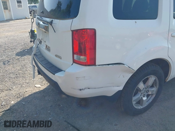2009 Honda Pilot EX-L with VIN 5FNYF48569B039103, listed as a IAAI auction lot 42651867 with 162,450 mi miles and . Bid and sale history available at DreamBid. Image 13.