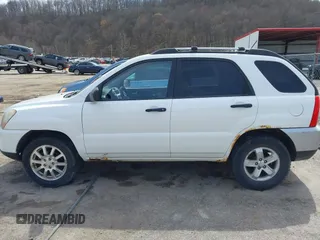 2009 Kia Sportage LX with VIN KNDJE723597560168, listed as a IAAI auction lot 41824779 with 110,386 mi miles. Bid and sale history available at carsss.com. Image 14.