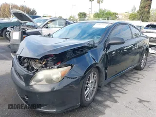 2007 Scion tC Spec with VIN JTKDE167070155986, listed as a IAAI auction lot 42062910 with 198,049 mi miles. Bid and sale history available at carsss.com. Image 17.