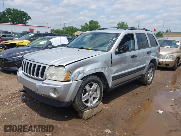2005 Jeep Grand Cherokee Laredo z VIN 1J4GR48K35C515589, wystawiony jako IAAI lot #42452874 z przebiegiem 253 743 mil mil oraz . Historia ofert i sprzedaży dostępna na DreamBid. Obrazek 17.