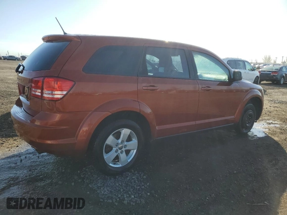 2013 Dodge Journey American Value with VIN 3C4PDCAB4DT590975, listed as a Copart auction lot 55627725 with 212,659 mi miles and Clean Title. Bid and sale history available at DreamBid. Image 3.