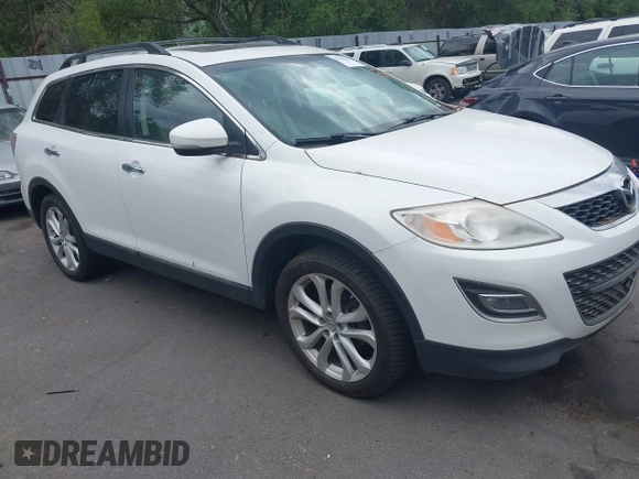 2012 Mazda CX-9 Grand Touring with VIN JM3TB3DA1C0356335, listed as a IAAI auction lot 42658284 with 141,537 mi miles and . Bid and sale history available at DreamBid. Image 1.