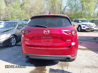 2021 Mazda CX-5 Grand Touring with VIN JM3KFBDM8M1390188, listed as a IAAI auction lot 42000444 with 84,908 mi miles. Bid and sale history available at carsss.com. Image 15.