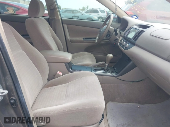 2006 Toyota Camry STD with VIN JTDBE32K163047233, listed as a IAAI auction lot 42088552 with 137,973 mi miles. Bid and sale history available at carsss.com. Image 5.