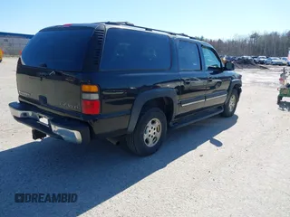 2005 Chevrolet Suburban LT with VIN 1GNFK16Z55J251296, listed as a IAAI auction lot 42119068 with 312,449 mi miles. Bid and sale history available at carsss.com. Image 4.
