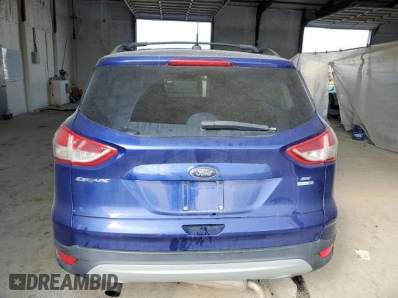 2013 Ford Escape SE z VIN 1FMCU9GX2DUD31603, wystawiony jako Copart lot #59081725 z przebiegiem 131 263 mil mil oraz Szkoda całkowita • Salvage title. Historia ofert i sprzedaży dostępna na DreamBid. Obrazek 6.