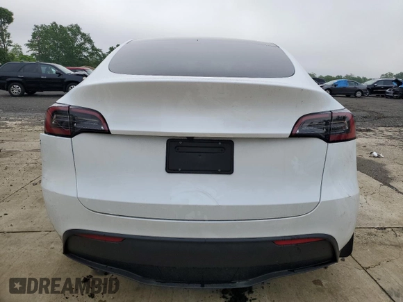2024 Tesla Model Y Long Range with VIN 7SAYGDEE2RA329081, listed as a Copart auction lot 57254265 with 2,325 mi miles and Salvage title. Bid and sale history available at DreamBid. Image 6.