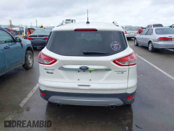 2016 Ford Escape Titanium with VIN 1FMCU9JX4GUB72080, listed as a IAAI auction lot 42519240 with 121,793 mi miles and . Bid and sale history available at DreamBid. Image 16.