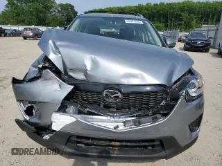 2015 Mazda CX-5 Sport with VIN JM3KE2BE4F0533273, listed as a Copart auction lot 60307795 with 120,484 mi miles and Salvage title. Bid and sale history available at DreamBid. Image 5.
