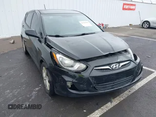 2012 Hyundai Accent SE with VIN KMHCU5AE1CU035390, listed as a IAAI auction lot 41765900 with 127,685 mi miles. Bid and sale history available at carsss.com. Image 6.