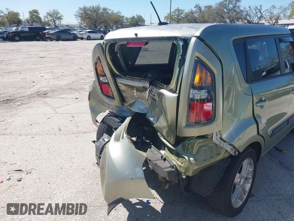 2011 Kia Soul + with VIN KNDJT2A21B7256665, listed as a IAAI auction lot 41741905 with 56,312 mi miles. Bid and sale history available at carsss.com. Image 12.