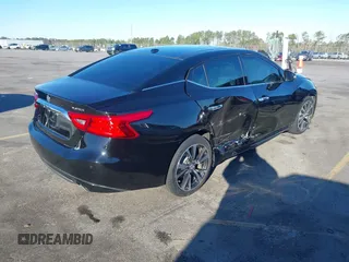 2016 Nissan Maxima SV with VIN 1N4AA6AP0GC385090, listed as a IAAI auction lot 41215857 with 97,072 mi miles and . Bid and sale history available at DreamBid. Image 4.