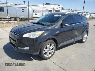 2015 Ford Escape Titanium with VIN 1FMCU0J97FUC80446, listed as a Copart auction lot 58749895 with 106,890 mi miles and Salvage title. Bid and sale history available at DreamBid. Image 1.