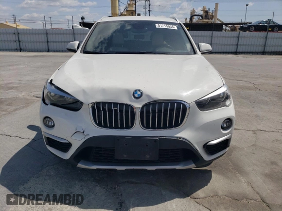 2018 BMW X1 xDrive28i with VIN WBXHT3C35J5L26952, listed as a Copart auction lot 51715035 with 63,306 mi miles and Salvage Title. Bid and sale history available at carsss.com. Image 5.